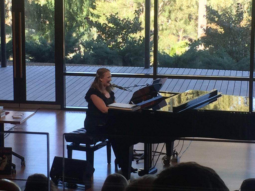 Emma Knights performing in The Piano Men